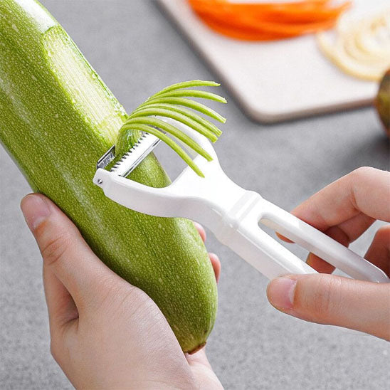 eplucheur-personne-qui-fait-des-juliennes-de-courgette