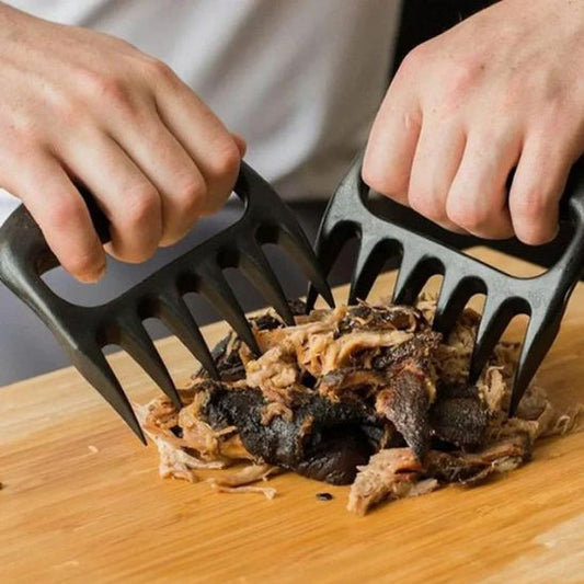 broyeur-viande-personne-qui-effiloche-du-porc