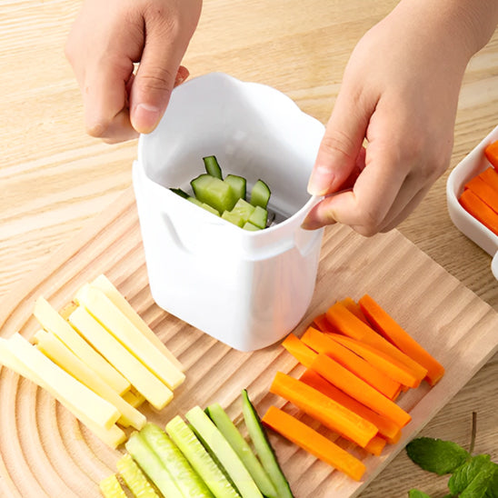 coupe-legumes-personne-qui-coupe-des-cocombres