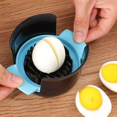 coupe-oeuf-personne-qui-a-couper-un-oeuf-en-deux