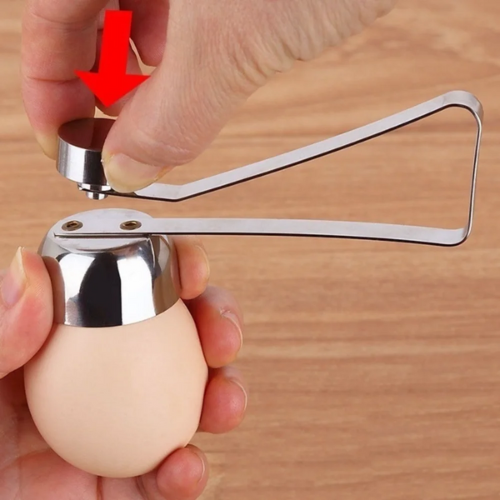 coupe-oeuf-personne-qui-casse-la-coquille-d-un-oeuf