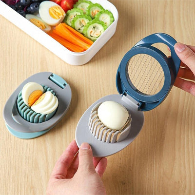 coupe-oeuf-personne-qui-va-trancher-un-oeuf-sur-la-table