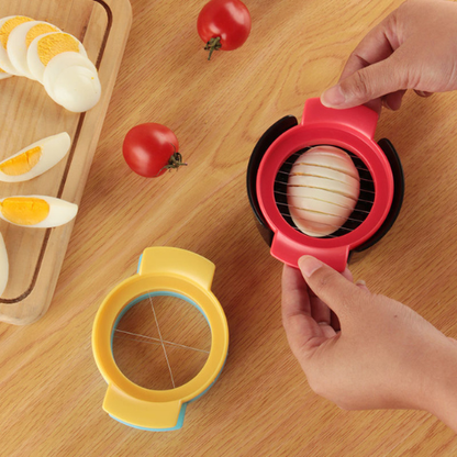 coupe-oeuf-perssone-qui-coupe-un-oeuf-en-tranche