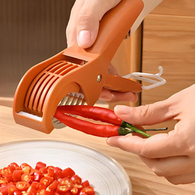 coupe-legumes-personne-qui-coupe-des-piments