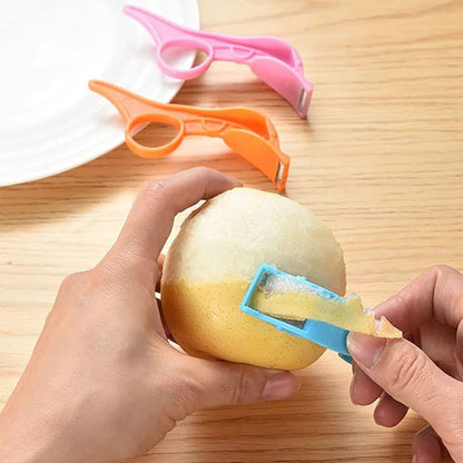 eplucheur-personne-qui-epluche-une-pomme-sur-un-comptoir