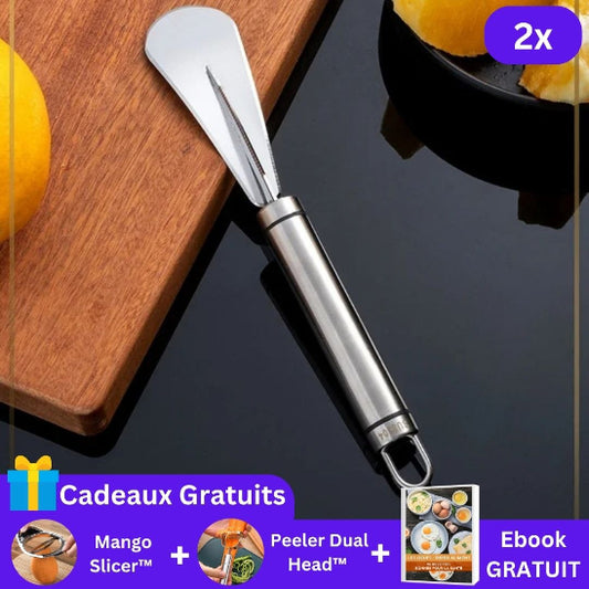eplucheur-sur-comptoir-avec-orange-planche