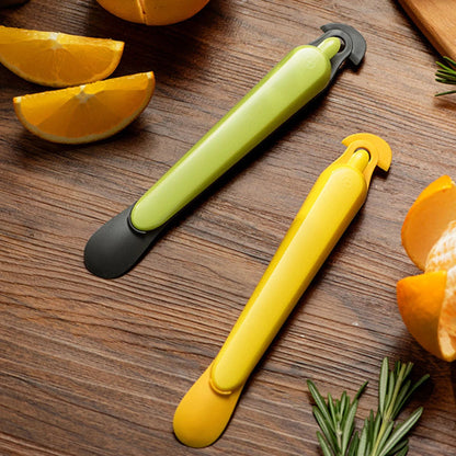 eplucheur-sur-la-table-avec-orange