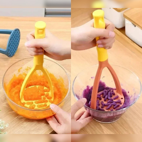 presse-puree-personne-qui-ecrase-carotte-betterave